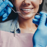 Woman in dental clinic 150x150